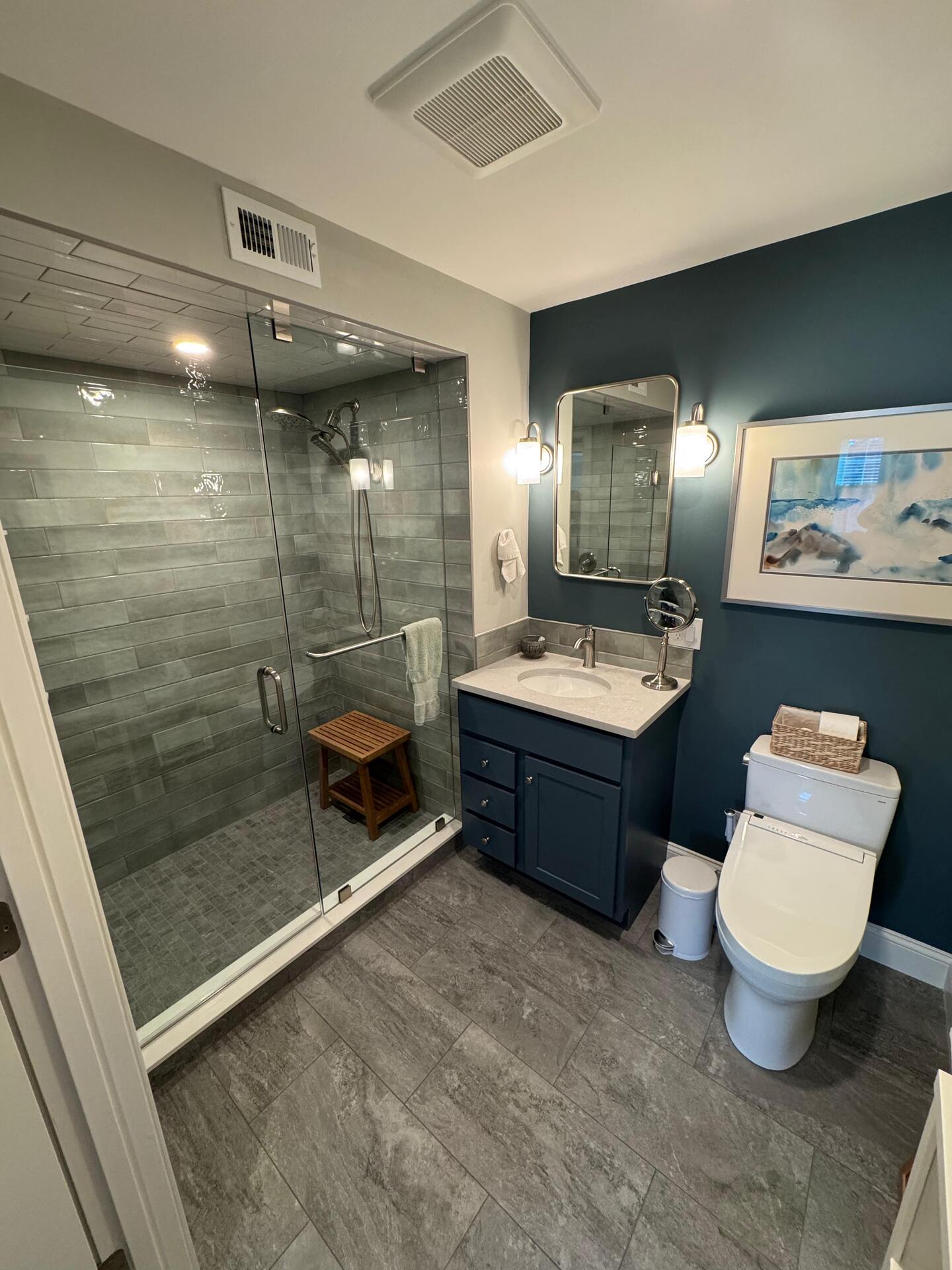Custom master bathroom vanity and marble tiling
